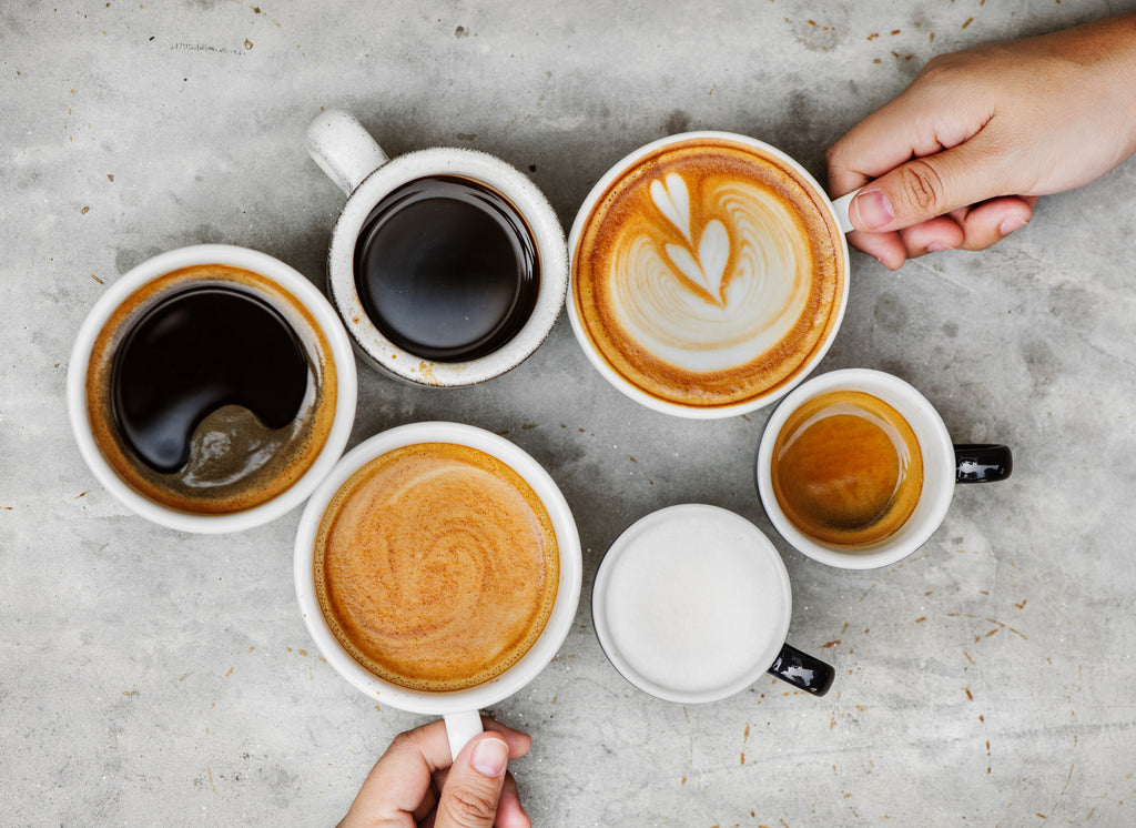 6 cups of different types of coffee - espresso, lunge, latte.